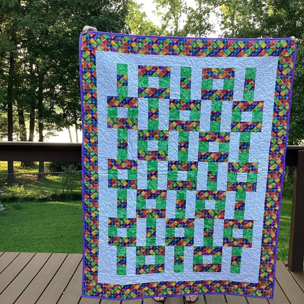 Handmade colorful lap quilt